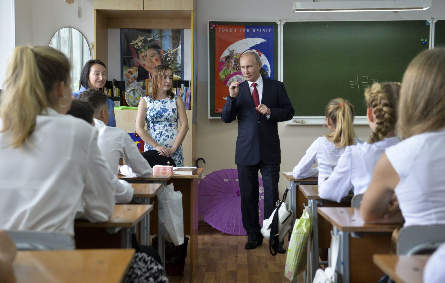 Russian President Vladimir Putin speaks before the start of a school lesson in Vladivostok. The new textbooks feature numerous quotations from Putin that consistently present positive assessments of the Soviet Union. Photo: Alexei Druzhinin/Sputnik/Kremlin Pool via AP
