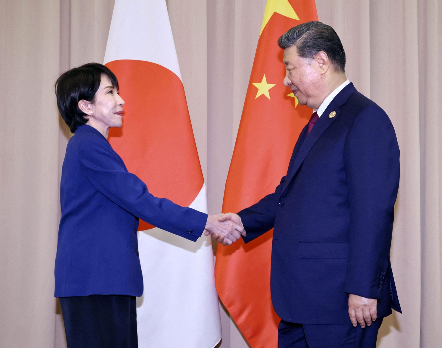 Sanae Takaichi und Xi Jinping. Foto: Kyodo/Reuters
