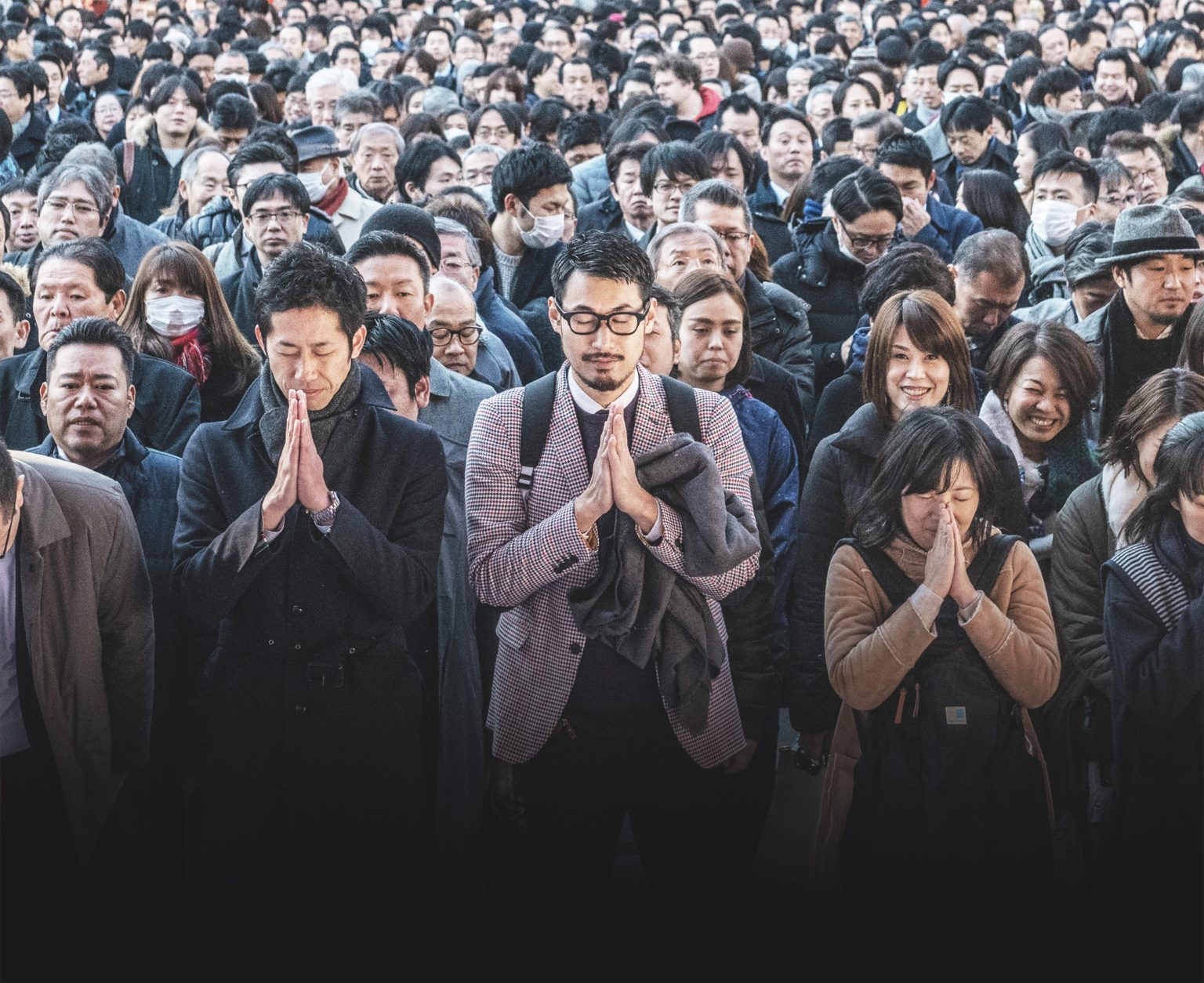People pray on the first working day of the year. Photo: Photo by Carl Court/Getty Images  