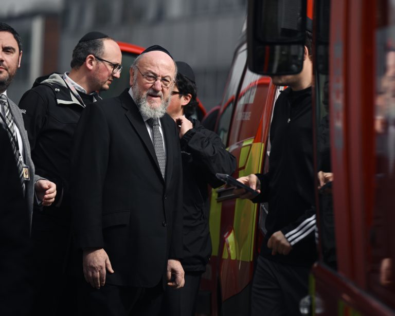 Chief Rabbi Sir Ephraim Mirvis attends the scene after four Hatzolah ambulances were set on fire. Photo: Leon Neal/Getty Images
