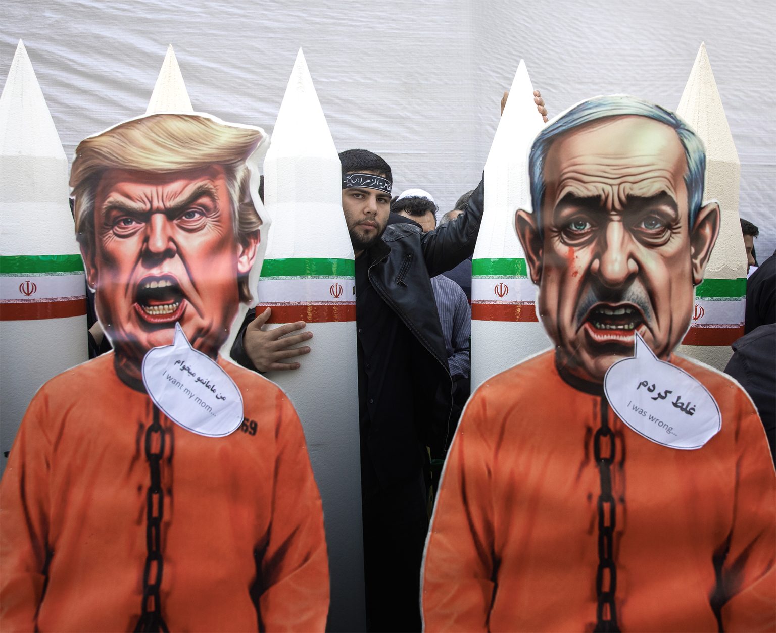 Cardboard cutouts of Benjamin Netanyahu and Donald Trump displayed in Tehran. Photo: Majid Saeedi/Getty Images