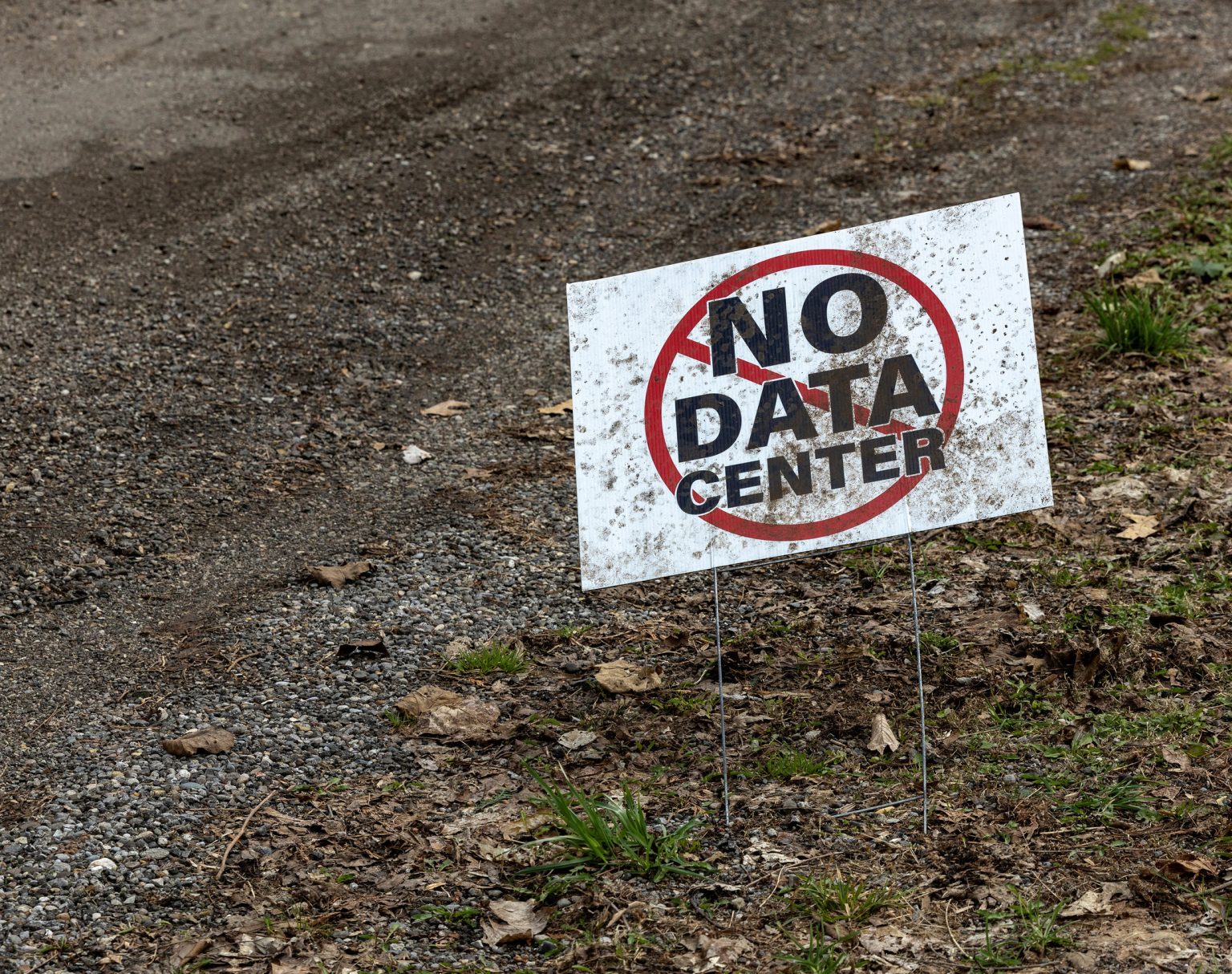 A “No Data Center” sign at an Amazon Web Services construction site in New Carlisle, Indiana, as the industry faces growing scrutiny and security risks. Photo: Jim Vondruska/Reuters
