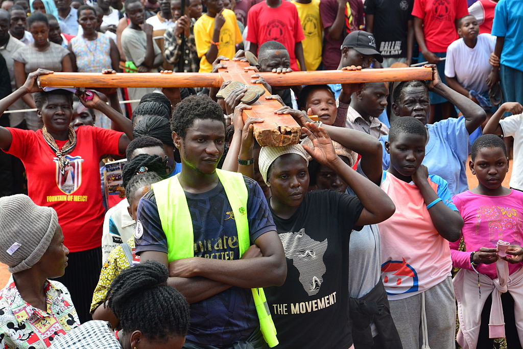 People attend a Good Friday procession in Kampala, Uganda, marking the crucifixion of Jesus. Photo: Nicholas Kajoba/Anadolu via Getty Images