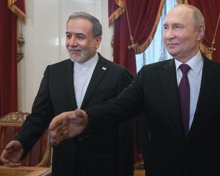 Russian President Vladimir Putin and Iranian Foreign Minister Abbas Araqchi. Photo: Dmitri Lovetsky/Pool via Reuters