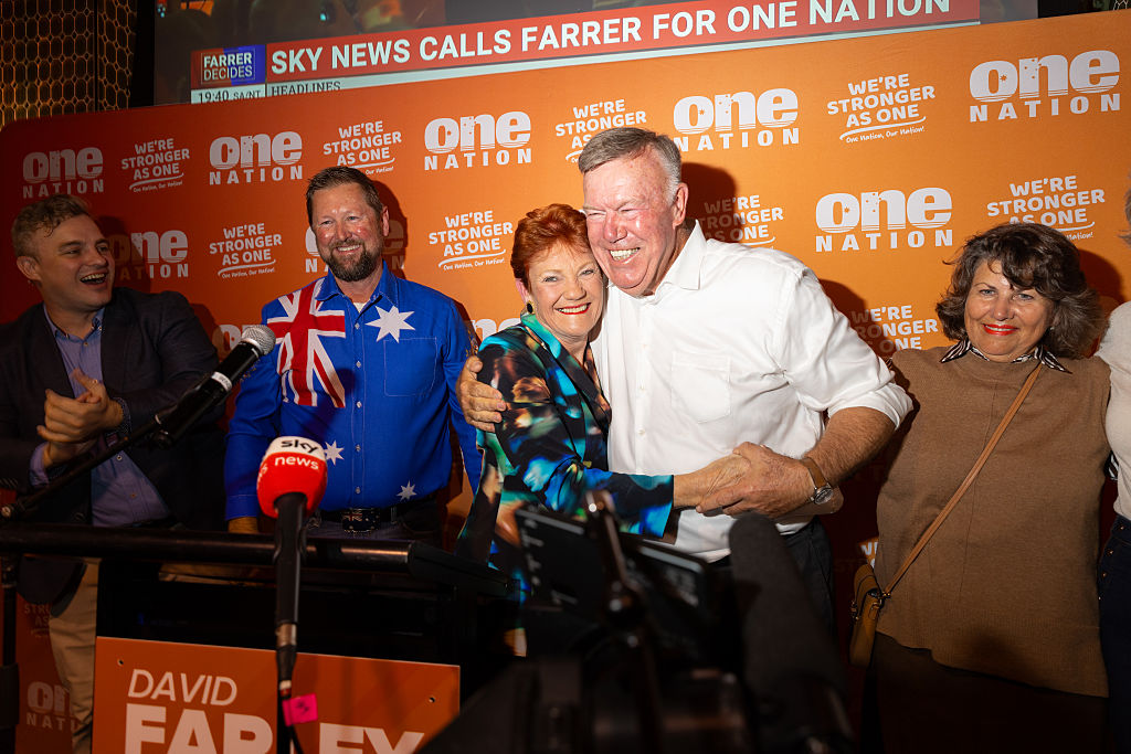 Pauline Hanson celebrates with David Farley after One Nation's victory.